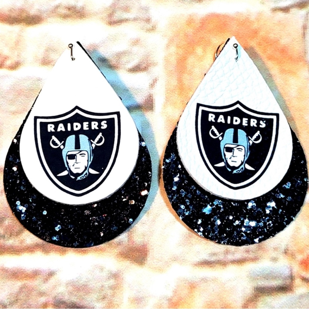 Bundle For Anna two pairs of earrings. Raiders & South Padres.